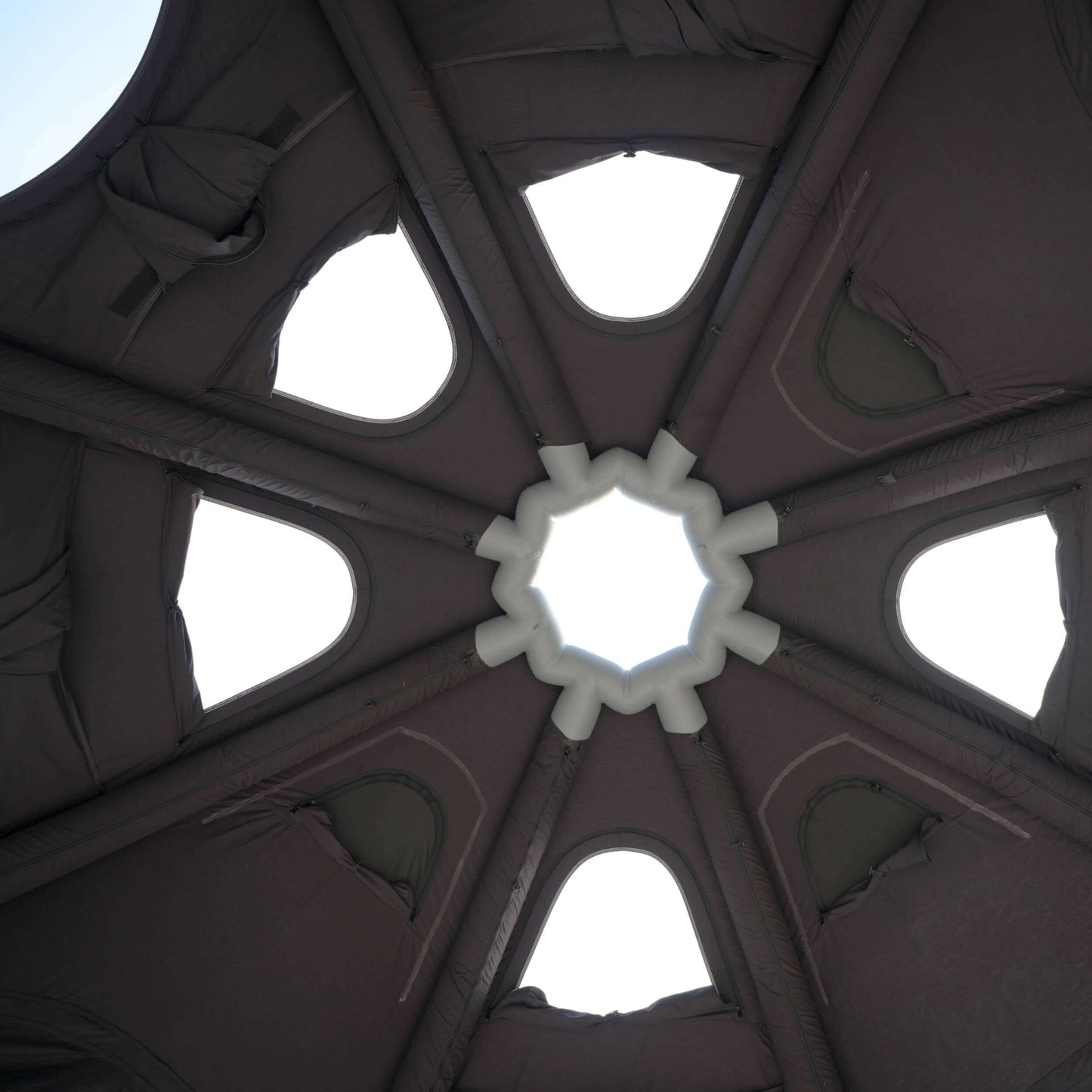 tent Ceiling with a central circular design and arches