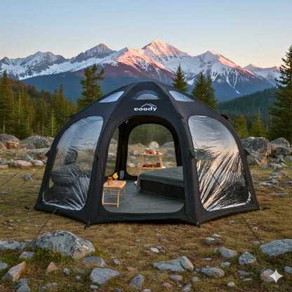Coody tent with a view of mountains 