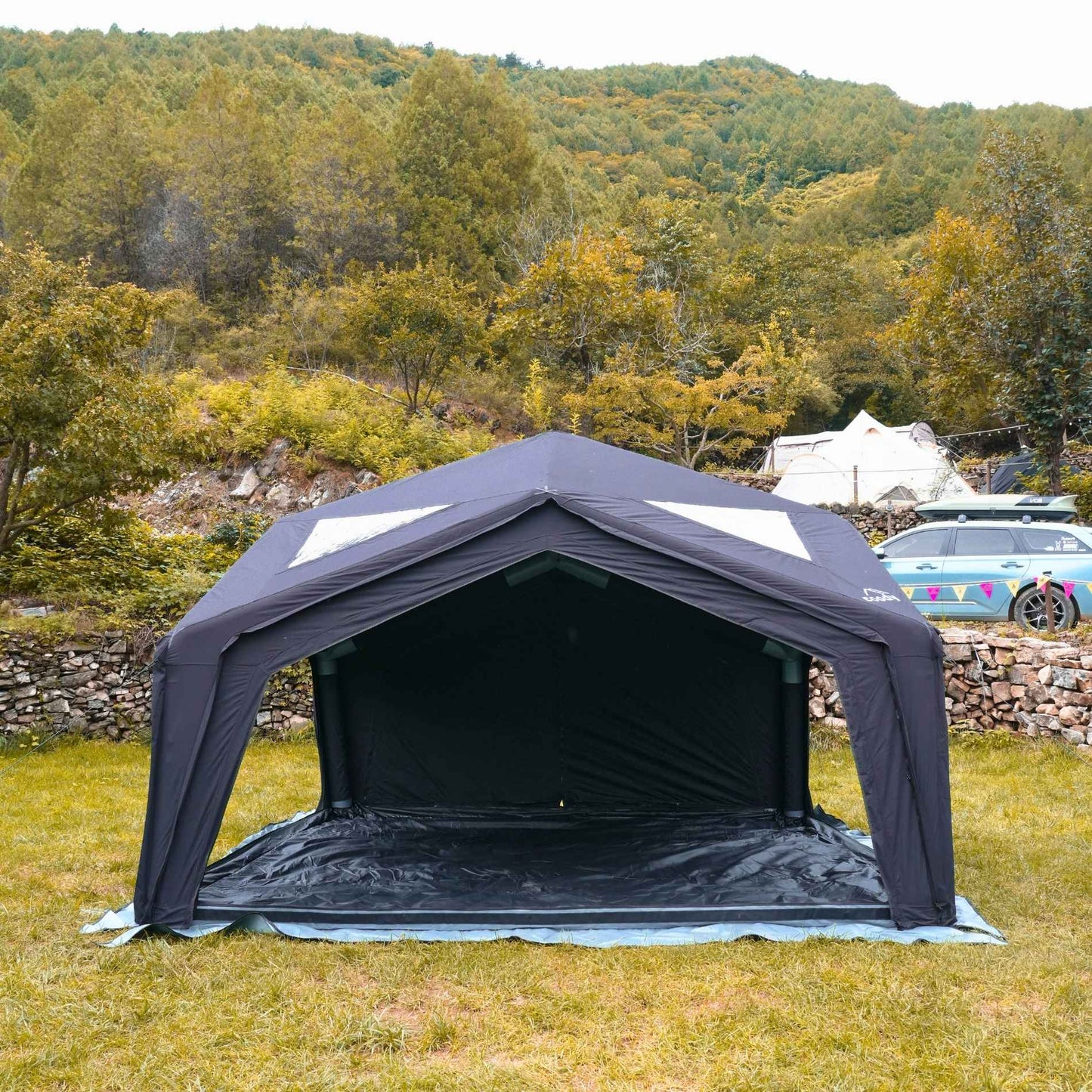 Black pop-up canopy tent set up outdoors
